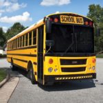 yellow school bus in neighborhood cul-de-sac